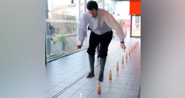 “A special achievement”; a recorded video of people blowing out candles with their feet