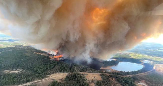 “Forest Fire Outbreak in Alberta: State of Emergency Declared and Evacuations Underway”